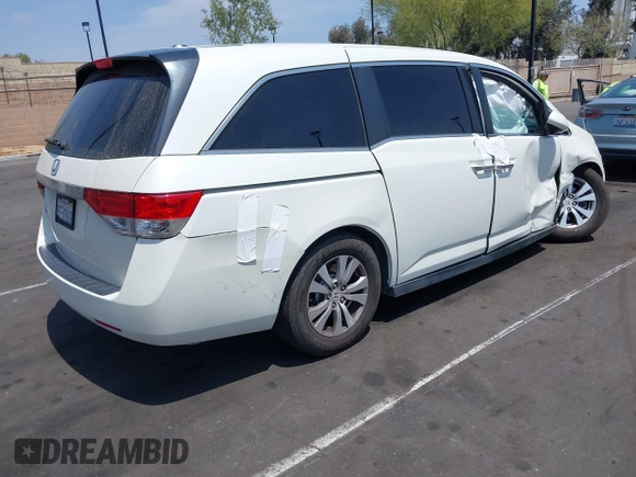 2015 Honda Odyssey EX-L with VIN 5FNRL5H62FB106545, listed as a IAAI auction lot 42115849 with 122,718 mi miles and . Bid and sale history available at DreamBid. Image 4.
