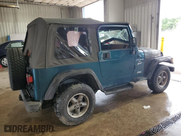 1997 Jeep Wrangler Sport with VIN 1J4FY19SXVP537075, listed as a Copart auction lot 61389915 with Not provided miles and Salvage title. Bid and sale history available at DreamBid. Image 3.