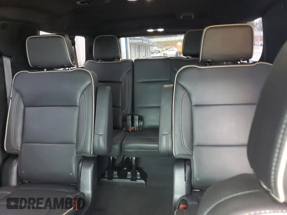 2023 Chevrolet Suburban Premier with VIN 1GNSCFKD4PR467132, listed as a Copart auction lot 57765515 with 25,934 mi miles and Clean title. Bid and sale history available at DreamBid. Image 10.