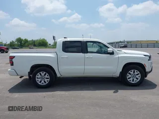 2022 Nissan Frontier SV z VIN 1N6ED1EJXNN693314, wystawiony jako IAAI lot #42322104 z przebiegiem 52 565 mil mil oraz . Historia ofert i sprzedaży dostępna na DreamBid. Obrazek 14.