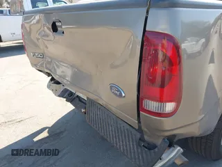 2002 Ford F-150 XL with VIN 1FTRX17WX2NA97846, listed as a IAAI auction lot 42682857 with 185,438 mi miles and . Bid and sale history available at DreamBid. Image 12.