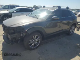 2020 Mazda CX-30 Select with VIN 3MVDMBCL5LM126555, listed as a Copart auction lot 63853615 with 66,293 mi miles and Salvage title. Bid and sale history available at DreamBid. Image 1.