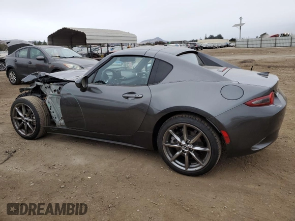 2022 Mazda MX-5 Miata Grand Touring z VIN JM1NDAM77N0501546, wystawiony jako Copart lot #82161264 z przebiegiem 12 245 mil mil oraz Szkoda całkowita • Salvage title. Historia ofert i sprzedaży dostępna na DreamBid. Obrazek 2.