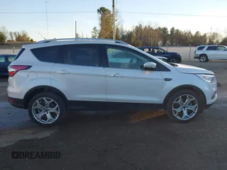 2017 Ford Escape Titanium with VIN 1FMCU0J98HUA75690, listed as a IAAI auction lot 41358534 with 90,376 mi miles. Bid and sale history available at carsss.com. Image 14.