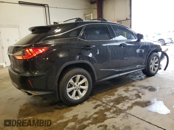 2016 Lexus RX 350 with VIN 2T2BZMCA3GC001679, listed as a Copart auction lot 57070835 with 74,729 mi miles and Salvage Title. Bid and sale history available at DreamBid. Image 3.