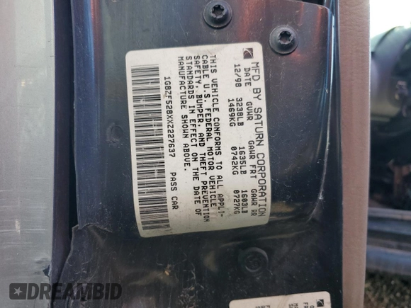 1999 Saturn SL with VIN 1G8ZF528XXZ227637, listed as a Copart auction lot 63764735 with Not provided miles and Non repairable. Bid and sale history available at DreamBid. Image 13.