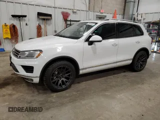 2015 Volkswagen Touareg Lux с VIN WVGEP9BP7FD002809, выставлен на аукционе Copart как лот 43944945 с пробегом Не указан миль и Чистый • Clean title. История ставок и продаж доступна на DreamBid. Изображение 1.