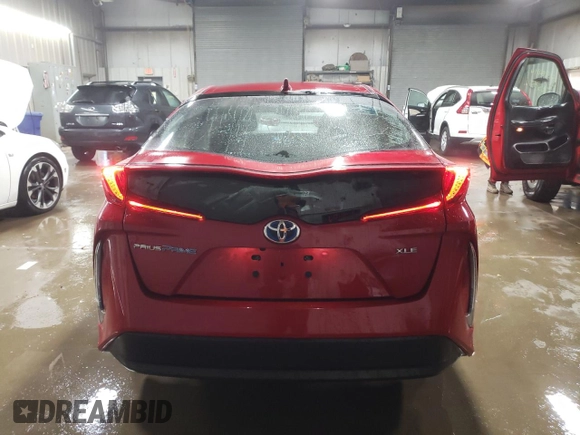 2020 Toyota Prius LE with VIN JTDKARFP2L3126409, listed as a Copart auction lot 83001854 with 74,811 mi miles and Salvage Title. Bid and sale history available at DreamBid. Image 6.