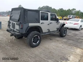 2007 Jeep Wrangler Unlimited X with VIN 1J4GA391X7L107424, listed as a IAAI auction lot 41752013 with 196,557 mi miles. Bid and sale history available at carsss.com. Image 4.