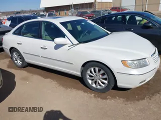 2007 Hyundai Azera SE z VIN KMHFC46F57A210341, wystawiony jako IAAI lot #41729427 z przebiegiem 113 301 mil mil oraz . Historia ofert i sprzedaży dostępna na DreamBid. Obrazek 13.