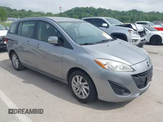 2013 Mazda 5 Sport z VIN JM1CW2BL9D0152248, wystawiony jako IAAI lot #42285155 z przebiegiem 112 890 mil mil oraz . Historia ofert i sprzedaży dostępna na DreamBid. Obrazek 1.
