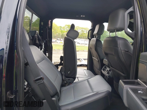 2023 Ford F-150 Lightning Pro with VIN 1FTVW1EL7PWG11924, listed as a IAAI auction lot 41991819 with 20,450 mi miles and . Bid and sale history available at DreamBid. Image 8.