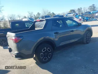 2024 Hyundai Santa Cruz SE z VIN 5NTJADAE5RH088273, wystawiony jako IAAI lot #41563660 z przebiegiem 14 873 mil mil oraz . Historia ofert i sprzedaży dostępna na DreamBid. Obrazek 4.
