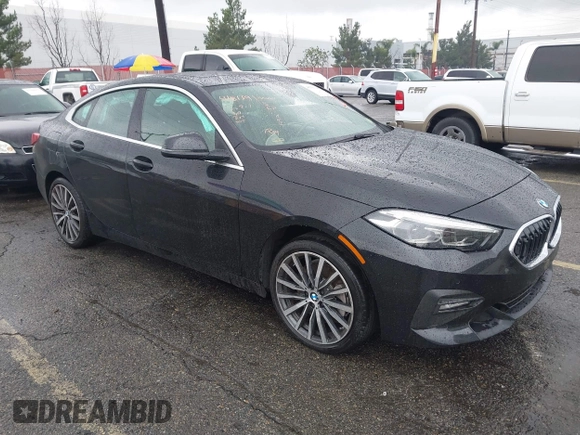 2023 BMW 2 Series 228i with VIN WBA53AK07P7M28114, listed as a IAAI auction lot 41559768 with 9,747 mi miles. Bid and sale history available at carsss.com. Image 1.
