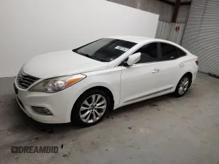 2014 Hyundai Azera Limited z VIN KMHFH4JG7EA365522, wystawiony jako Copart lot #62744675 z przebiegiem 132 013 mil mil oraz Czysty tytuł • Clean title. Historia ofert i sprzedaży dostępna na DreamBid. Obrazek 1.