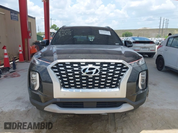 2021 Hyundai Palisade SEL z VIN KM8R34HE5MU202798, wystawiony jako IAAI lot #42339654 z przebiegiem 104 689 mil mil oraz . Historia ofert i sprzedaży dostępna na DreamBid. Obrazek 11.