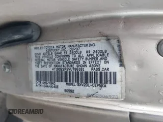 1997 Toyota Camry LE z VIN 4T1BG22K9VU786181, wystawiony jako IAAI lot #41610928 z przebiegiem 338 829 mil mil oraz . Historia ofert i sprzedaży dostępna na DreamBid. Obrazek 9.