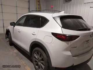 2019 Mazda CX-5 Grand Touring with VIN JM3KFADM7K1563576, listed as a IAAI auction lot 41617026 with NaN miles. Bid and sale history available at carsss.com. Image 3.