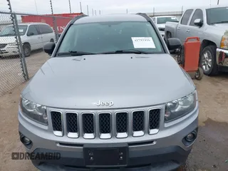 2016 Jeep Compass Sport with VIN 1C4NJDBB8GD780146, listed as a IAAI auction lot 41792416 with 127,548 mi miles. Bid and sale history available at carsss.com. Image 12.