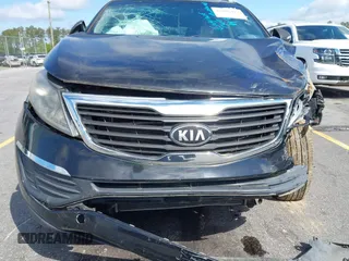 2013 Kia Sportage LX with VIN KNDPB3A27D7428624, listed as a IAAI auction lot 42006497 with 91,244 mi miles. Bid and sale history available at carsss.com. Image 6.