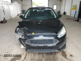 2015 Ford Focus SE с VIN 1FADP3F29FL274320, выставлен на аукционе Copart как лот 55434445 с пробегом 149 126 миль миль и Списание • Salvage title. История ставок и продаж доступна на DreamBid. Изображение 5.