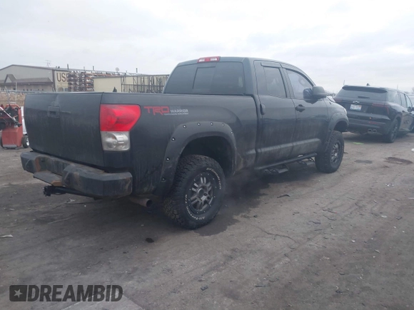 2009 Toyota Tundra 4WD Truck with VIN 5TFBW54119X091419, listed as a IAAI auction lot 41031994 with 214,922 mi miles. Bid and sale history available at carsss.com. Image 4.
