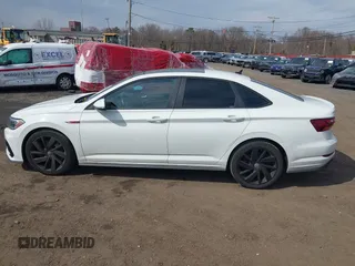 2019 Volkswagen Jetta GLI S with VIN 3VW6T7BU1KM194402, listed as a IAAI auction lot 41838123 with 67,536 mi miles and . Bid and sale history available at DreamBid. Image 14.