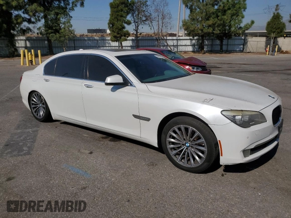 2012 BMW 7 Series 740Li with VIN WBAKB4C55CC575826, listed as a Copart auction lot 74012564 with 140,577 mi miles and Salvage Title. Bid and sale history available at carsss.com. Image 4.