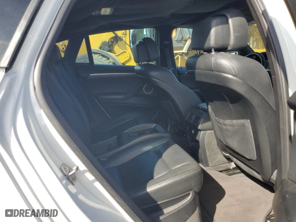 2011 BMW X6 M with VIN 5YMGZ0C55BLK13899, listed as a Copart auction lot 77141774 with 93,316 mi miles and Salvage Title. Bid and sale history available at carsss.com. Image 11.