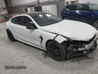 2020 BMW M8 with VIN WBSGV0C06LCE47698, listed as a IAAI auction lot 41457199 with 50,772 mi miles. Bid and sale history available at carsss.com. Image 1.
