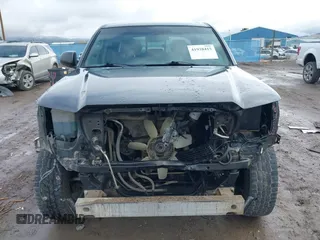 2013 Toyota Tacoma with VIN 3TMLU4EN7DM113315, listed as a IAAI auction lot 41938415 with 228,912 mi miles and . Bid and sale history available at DreamBid. Image 13.