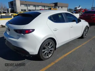 2020 Mazda Mazda3 Hatchback with VIN JM1BPALM8L1155418, listed as a IAAI auction lot 41285148 with 42,781 mi miles. Bid and sale history available at carsss.com. Image 4.