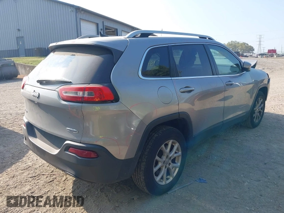 2016 Jeep Cherokee Altitude with VIN 1C4PJMCB0GW108819, listed as a IAAI auction lot 40198342 with 128,949 mi miles and . Bid and sale history available at DreamBid. Image 4.
