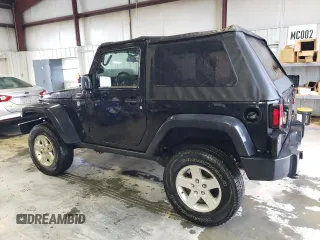 2013 Jeep Wrangler Rubicon with VIN 1C4BJWCG1DL584611, listed as a Copart auction lot 71536944 with 142,975 mi miles and Salvage title. Bid and sale history available at DreamBid. Image 2.
