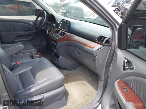 2007 Honda Odyssey EX-L with VIN 5FNRL38747B121059, listed as a IAAI auction lot 42211056 with 171,838 mi miles and . Bid and sale history available at DreamBid. Image 5.