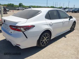 2023 Toyota Camry SE with VIN 4T1G11AK5PU757783, listed as a IAAI auction lot 41945780 with 47,883 mi miles and . Bid and sale history available at DreamBid. Image 4.
