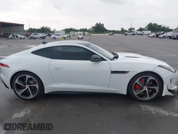 2015 Jaguar F-Type R z VIN SAJWA6DA8FMK20244, wystawiony jako IAAI lot #42130845 z przebiegiem 72 408 mil mil oraz . Historia ofert i sprzedaży dostępna na DreamBid. Obrazek 13.