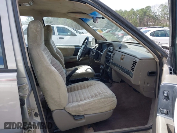 1994 Jeep Grand Cherokee Laredo with VIN 1J4GZ58Y0RC200247, listed as a IAAI auction lot 41781078 with 217,698 mi miles. Bid and sale history available at carsss.com. Image 5.