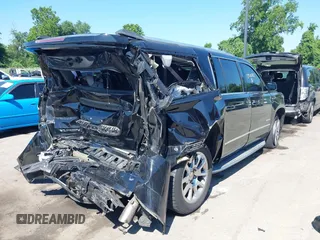 2015 GMC Yukon XL Denali with VIN 1GKS2JKJ9FR244754, listed as a IAAI auction lot 39706952 with 94,917 mi miles. Bid and sale history available at carsss.com. Image 4.
