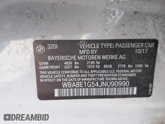 2018 BMW 3 Series 320i with VIN WBA8E1G54JNU90990, listed as a IAAI auction lot 41801197 with 140,603 mi miles. Bid and sale history available at carsss.com. Image 9.