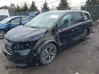 2023 Honda Odyssey Touring with VIN 5FNRL6H81PB068721, listed as a IAAI auction lot 41489618 with 20,202 mi miles and . Bid and sale history available at DreamBid. Image 2.