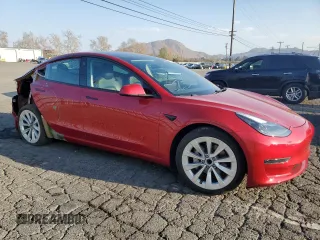 2021 Tesla Model 3 Standard Range Plus with VIN 5YJ3E1EA0MF939193, listed as a Copart auction lot 44625105 with 30,679 mi miles and Salvage Title. Bid and sale history available at DreamBid. Image 4.