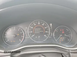 2020 Mazda 3 z VIN 3MZBPABLXLM138984, wystawiony jako Copart lot #59955215 z przebiegiem 53 125 mil mil oraz Nie do naprawy • Non repairable. Historia ofert i sprzedaży dostępna na DreamBid. Obrazek 9.