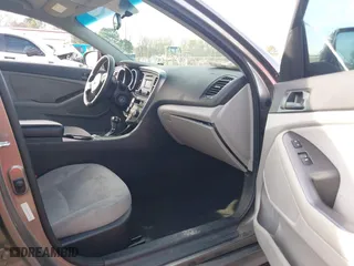 2015 Kia Optima LX with VIN 5XXGM4A78FG503983, listed as a IAAI auction lot 41843823 with 150,222 mi miles. Bid and sale history available at carsss.com. Image 5.