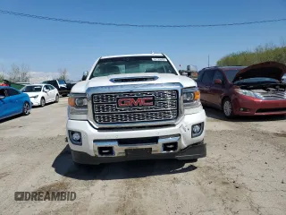 2019 GMC Sierra 2500HD Denali z VIN 1GT12SEY2KF106040, wystawiony jako Copart lot #54123885 z przebiegiem 153 684 mil mil oraz Szkoda całkowita • Salvage title. Historia ofert i sprzedaży dostępna na DreamBid. Obrazek 5.