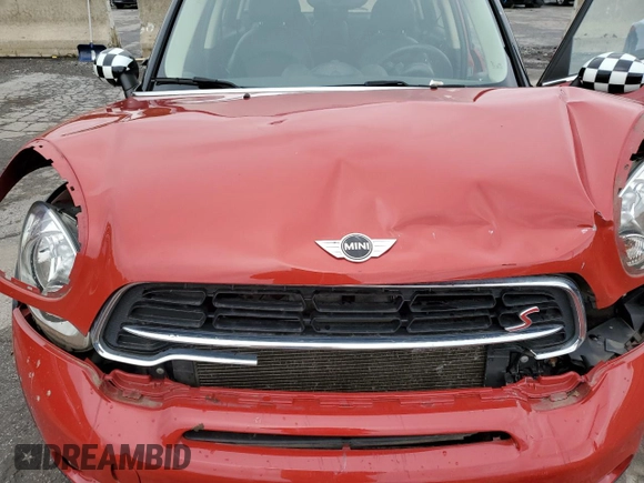 2015 MINI Countryman S with VIN WMWZC5C54FWP42858, listed as a Copart auction lot 60684185 with 83,163 mi miles and Salvage title. Bid and sale history available at DreamBid. Image 11.