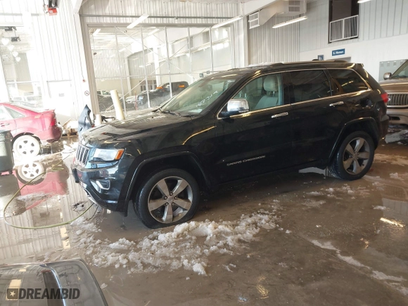 2014 Jeep Grand Cherokee Overland with VIN 1C4RJFCT7EC187319, listed as a IAAI auction lot 41256107 with 98,287 mi miles. Bid and sale history available at carsss.com. Image 18.