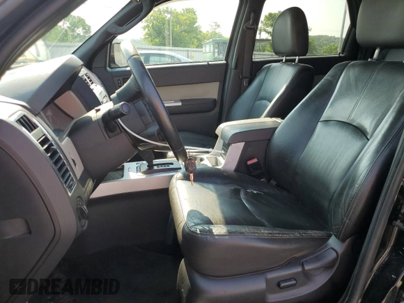 2009 Mercury Mariner Premier с VIN 4M2CU97G69KJ23595, выставлен на аукционе Copart как лот 59131405 с пробегом 153 196 миль миль и Списание • Salvage title. История ставок и продаж доступна на DreamBid. Изображение 7.