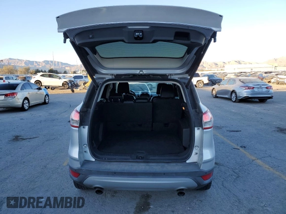 2016 Ford Escape Titanium with VIN 1FMCU9J95GUA69932, listed as a Copart auction lot 88470175 with 108,471 mi miles and Salvage title. Bid and sale history available at DreamBid. Image 6.