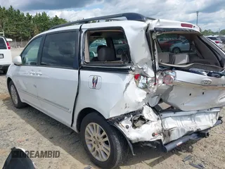 2007 Toyota Sienna XLE with VIN 5TDZK22C57S074123, listed as a IAAI auction lot 42128064 with 184,183 mi miles and . Bid and sale history available at DreamBid. Image 3.